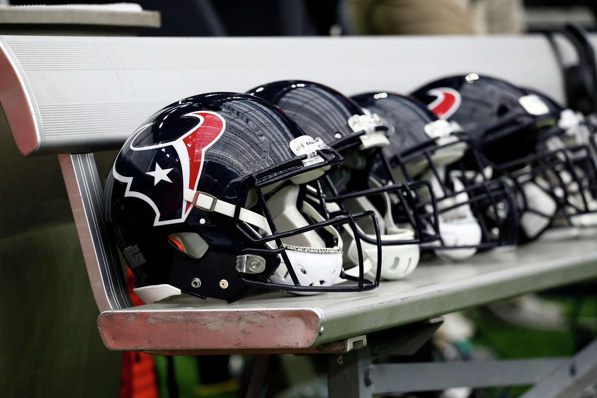 Houston Texans helmets sit on the bench before an NFL football game against the Cleveland Browns on Sunday, Oct. 15, 2017, in Houston. (AP Photo/Eric Gay)