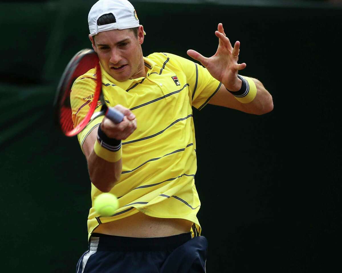 United States John Isner plays against Switzerland Henri Laaksonen during a U.S. Men's Clay Court Championships men's single Round of 16 at River Oaks Country Club on Thursday, April 12, 2018, in Houston. Isner won the match 6-4 and 6-2.
