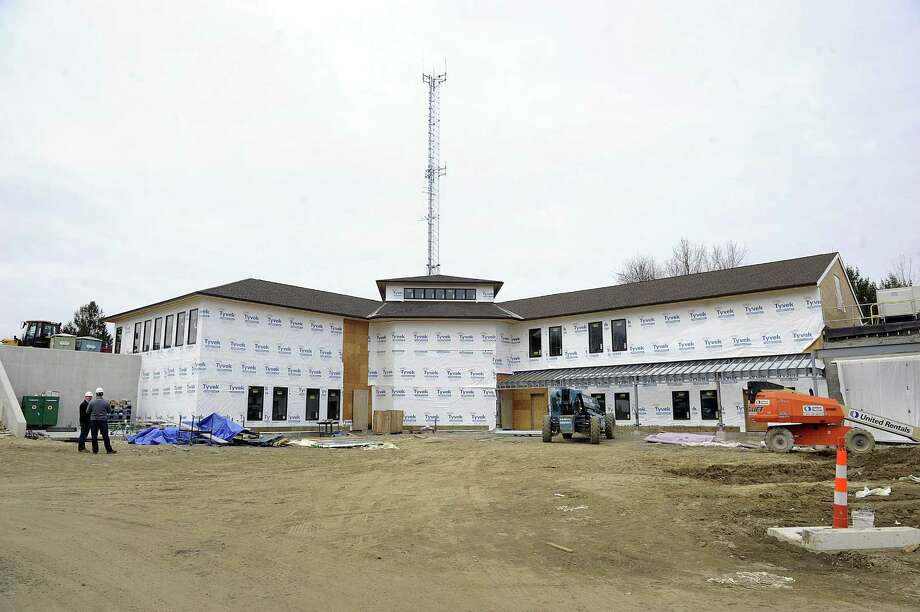 Work continues on the building of the new Bethel Police Headquarters Wednesday, March 28, 2018. The project is more than $888,000 over budget. Photo: Carol Kaliff / Hearst Connecticut Media / The News-Times