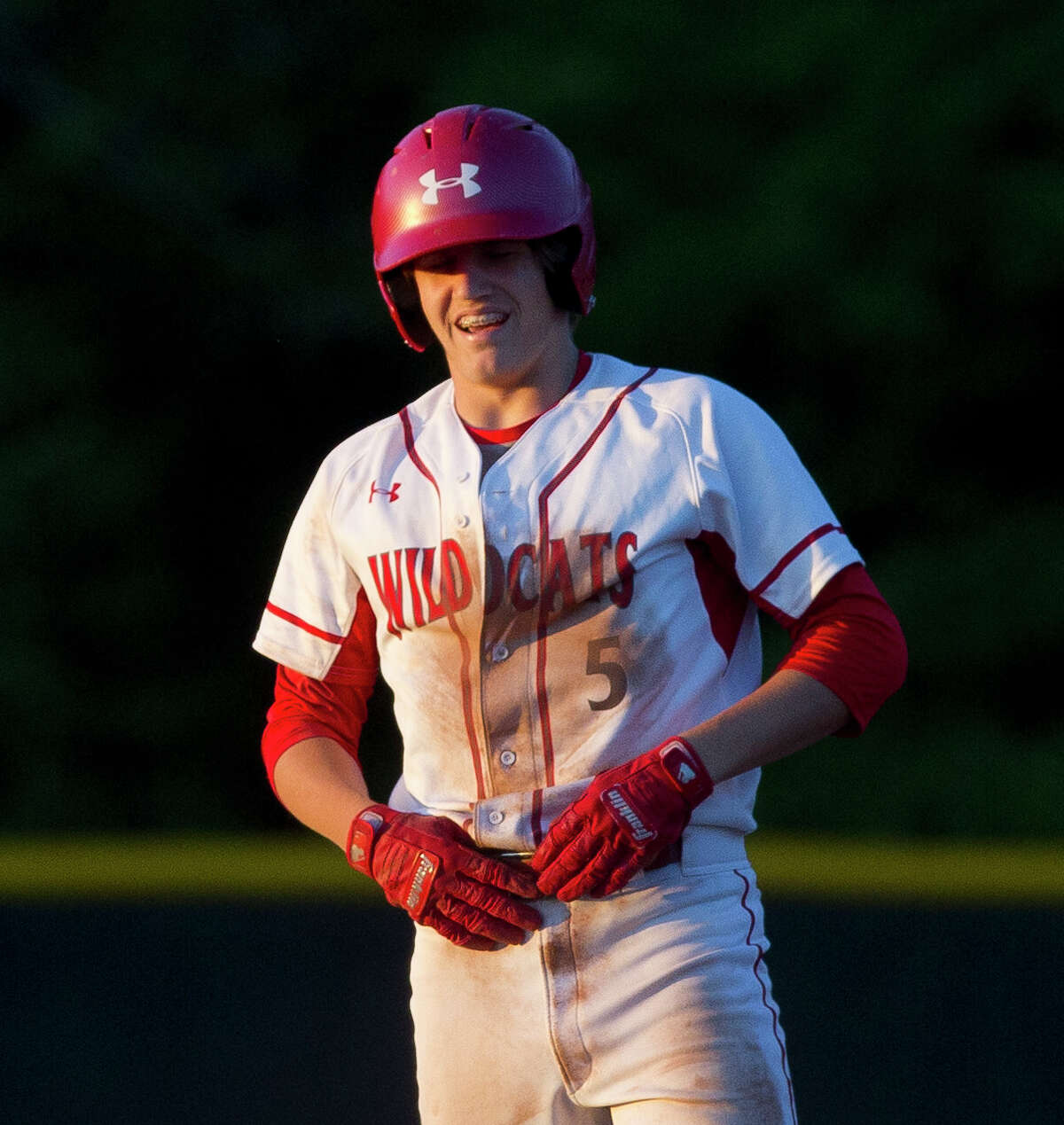 Dylan Johnson #5 of Splendora reacts after hitting a double during the fifth inning of a District 21-5A high school baseball game at Splendora High School, Tuesday, April 10, 2018, in Splendora.