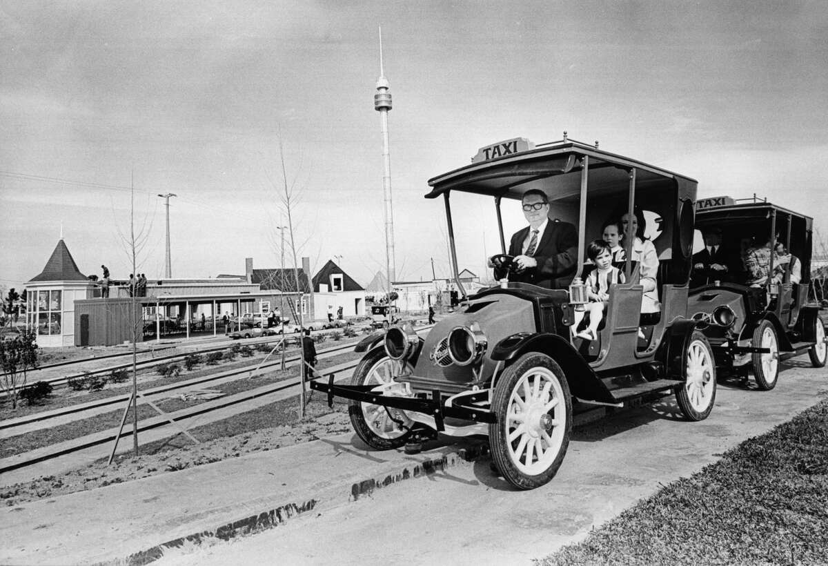 Former Houston Mayor Roy Hofheinz and his family owned the park for just under a decade. (Photo: Astroworld builder Roy Hofheinz gives his daughter, Dene Hofheinz Mann, and grandchildren, Dinn Mann, 2 1/2, front, and Mark Mann, 4, the first ride aboard this circa 1918 taxicab, one of a fleet of 35 being installed at the amusement park on Feb. 27, 1968)