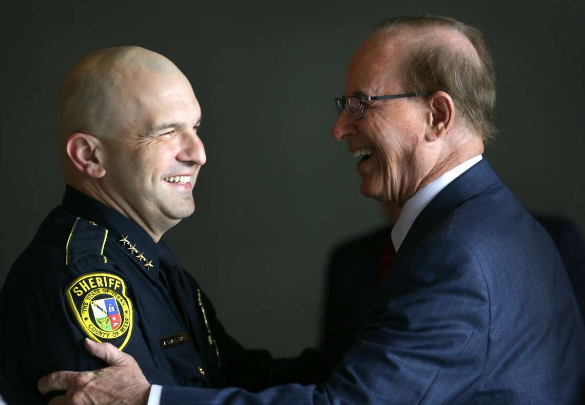Bexar County Judge Nelson Wolfe, right, greets Sheriff Javier Salazar at the tour of the new Bexar County Justice Intake and Assessment Center which has been built next to the Bexar County Jail, on Friday, April 13, 2018.