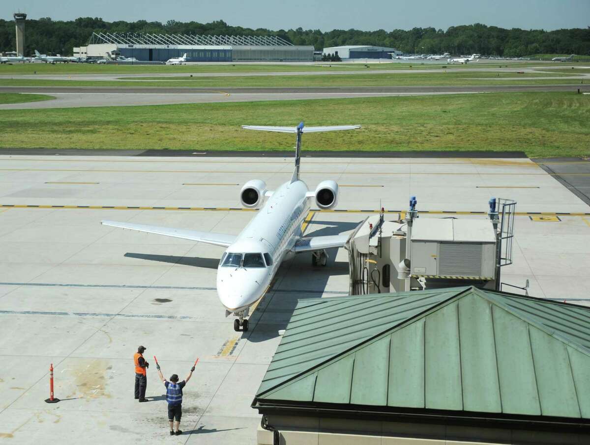A plane returns to the terminal at Westchester County Airport in White Plains, N.Y. Tuesday, Aug. 1, 2017.