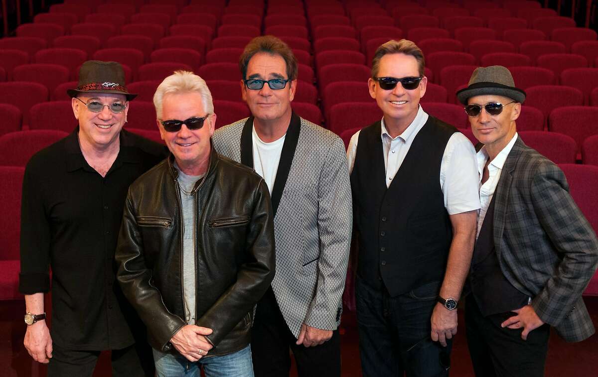 Huey Lewis, center, and The News.