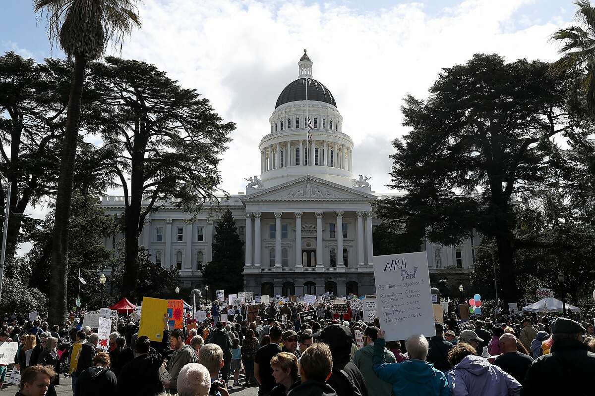 SACRAMENTO, CA - MARCH 24: Protesters gather at the California State Capitol during a March for Our Lives demonstration on March 24, 2018 in Sacramento, California. More than 800 March for Our Lives events, organized by survivors of the Parkland, Florida school shooting on February 14 that left 17 dead, are taking place around the world to call for legislative action to address school safety and gun violence. (Photo by Justin Sullivan/Getty Images)