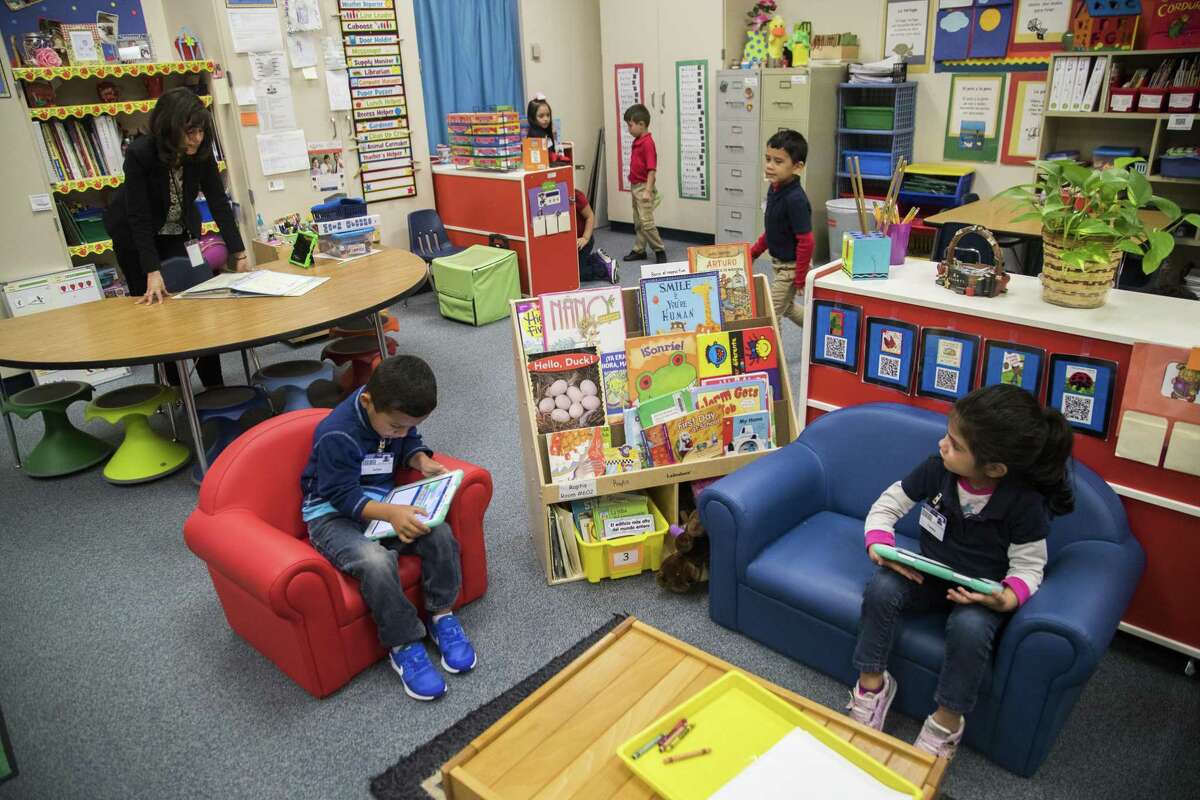 Rees Elementary School pre-kindergarten teacher Atenea Raptis goes over her list of student names calling them to join her at the table to work on writing, Wednesday, April 4, 2018, in Houston. ( Marie D. De Jesus / Houston Chronicle )
