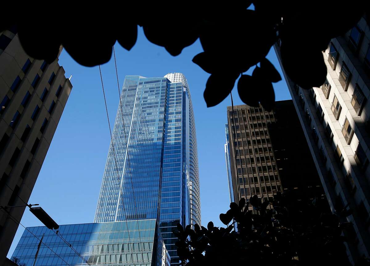 The Millennium Tower is seen in front of Salesforce Tower in San Francisco, Calif. on Tuesday, March 27, 2018. Engineers may begin preliminary work soon to stabilize the sinking and leaning Millennium Tower.