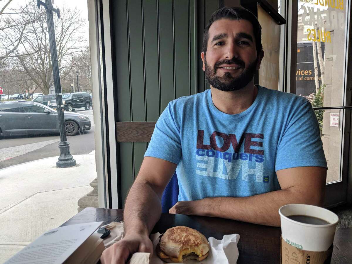 Arif Kocabs is moving to Cos Cob come April, he said at Starbucks on Greenwich Avenue on Thursday April 12, 2018. He is excited for spring to finally arrive so he can explore the wonderful things he's been reading about the neighborhood.
