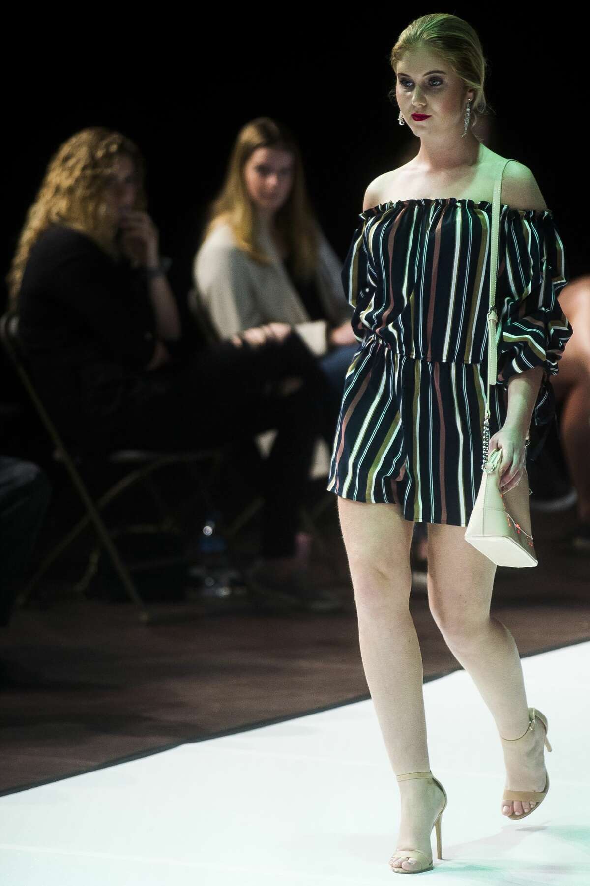 A model walks the runway during Northwood University's 17th annual Style Show on Friday, April 13, 2018 at Northwood. (Katy Kildee/kkildee@mdn.net)