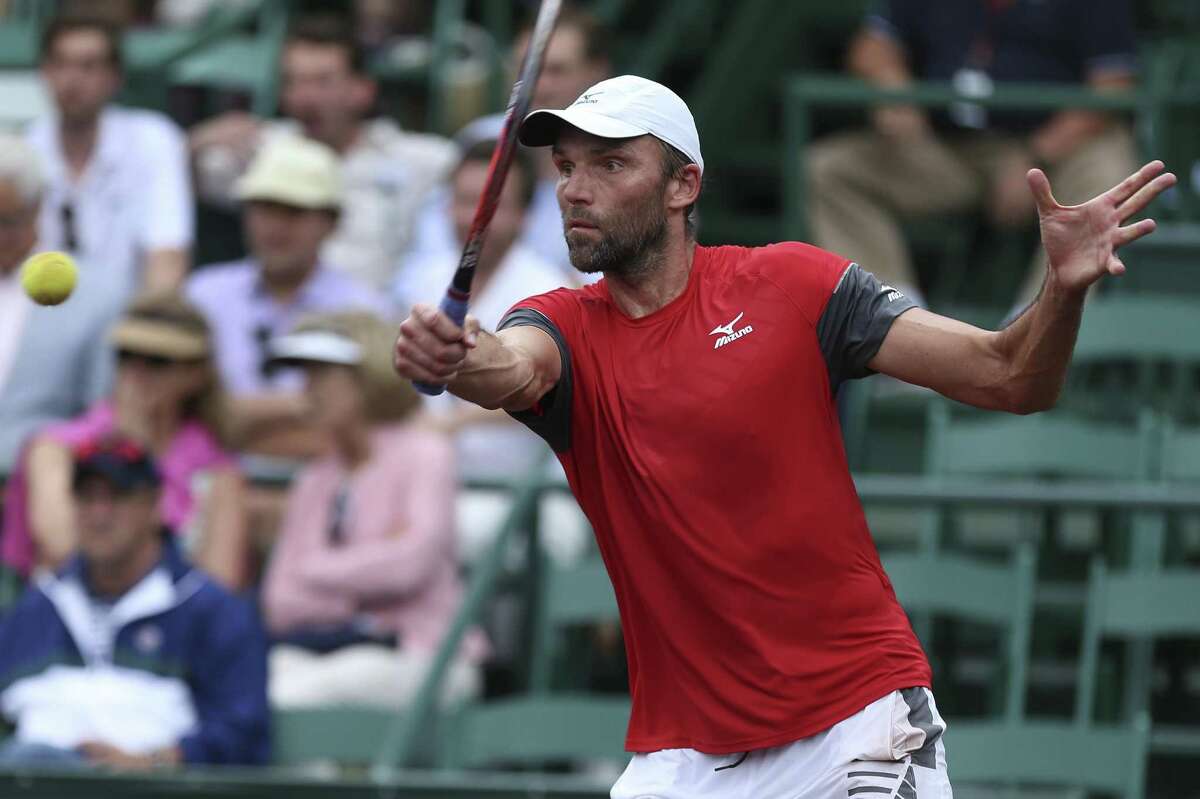 Croatia's Ivo Karlovic, above, beat fourth seed Nick Kyrgios of Australia in three sets Friday to advance to the semifinals of the U.S. Men's Clay Court Championship.