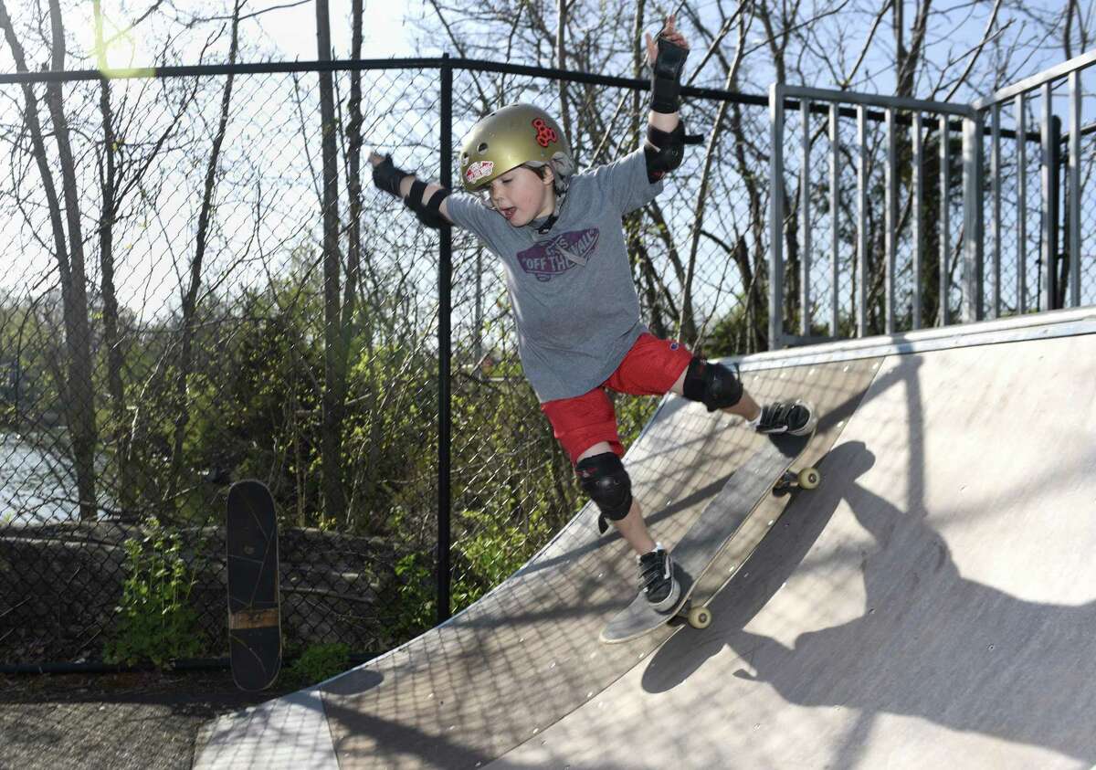 Robert Lang, 6, of Old Greenwich, drops in on a ramp during a lesson at the Greenwich Skatepark in 2016. With new concrete ramps in place, the skatepark is expected to be more popular than ever as registration for summer skate programs has opened.