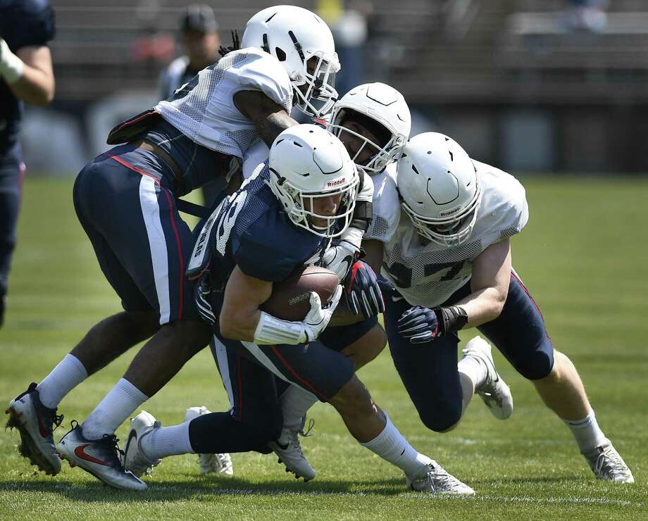 jeff jacobs: huskies football players aim high, bet on themselve