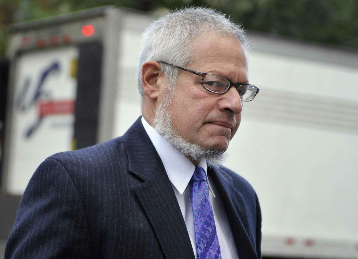 Attorney Thomas Ullmann, Public Defender for Steven Hayes, arrives at Superior Court for the first day of the penalty phase of the trial of 47-year-old Steven Hayes in New Haven, Conn., on Monday, Oct. 18, 2010. Hayes was convicted of 16 counts for the 2007 killings in Cheshire. (AP Photo/Jessica Hill)