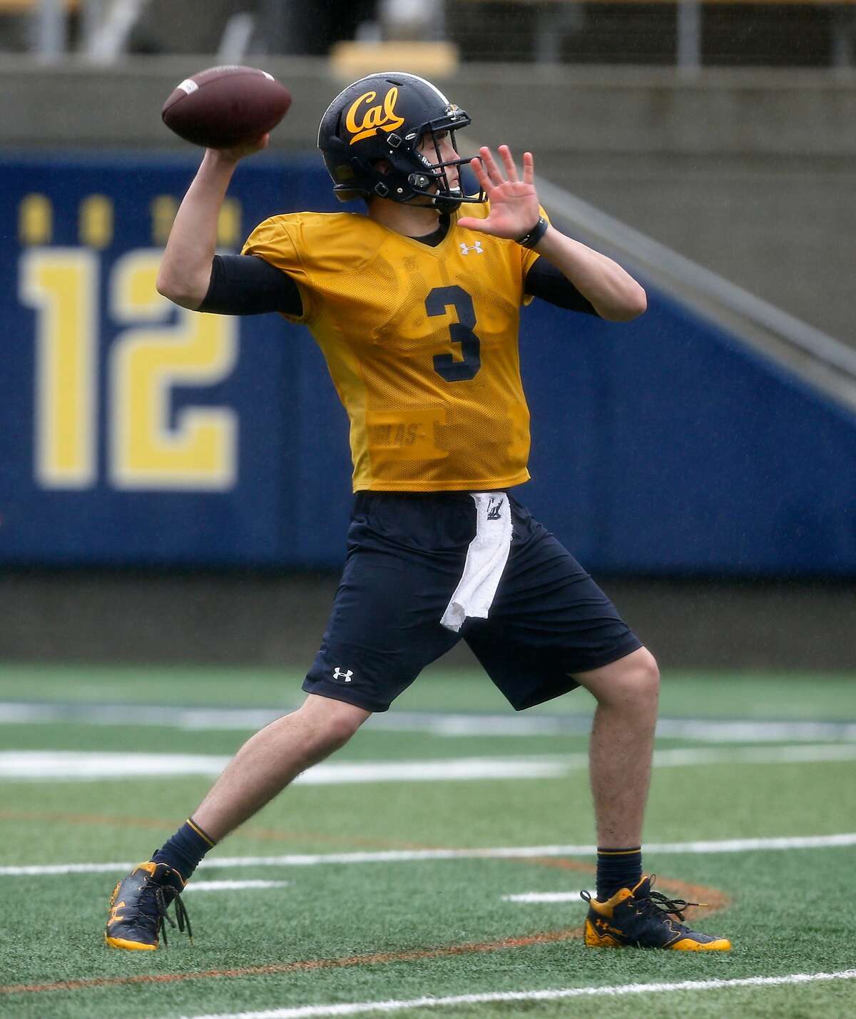 Quarterback Ross Bowers throws a pass during a Cal Bears football practice in Memorial Stadium at UC Berkeley on Friday, April 6, 2018.