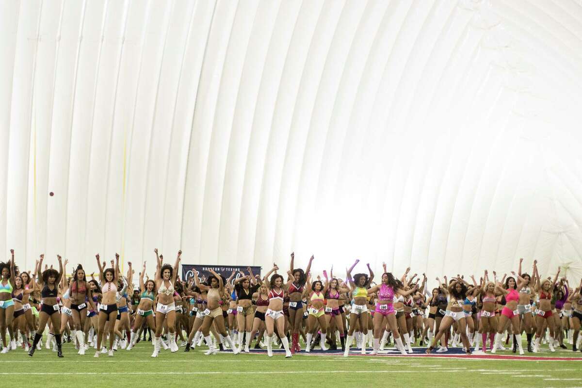 Candidates to the Texans Cheerleader team learn the routine they will perform for the judges to win a spot in the team, Saturday, April 14, 2018, in Houston.