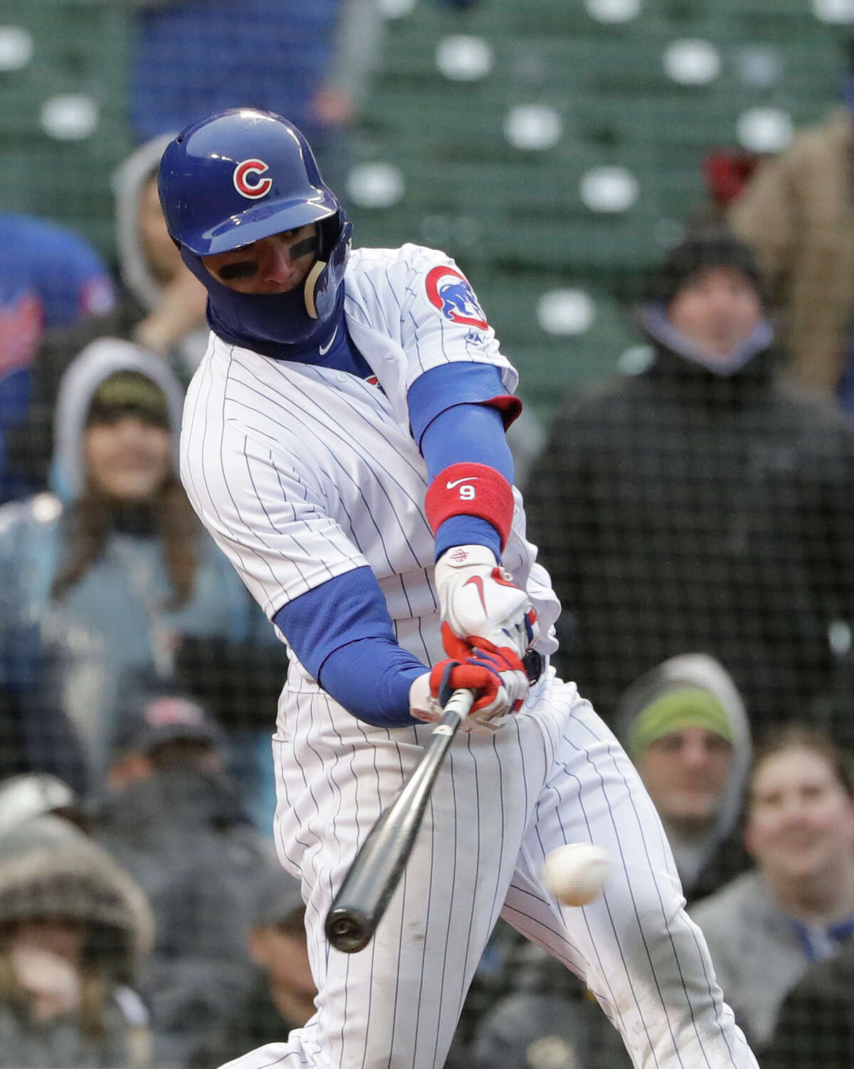 Chicago Cubs' Javier Baez hits a three-run double against the Atlanta Braves during the eighth inning of a baseball game Saturday, April 14, 2018, in Chicago. The Cubs won 14-10. (AP Photo/Nam Y. Huh)