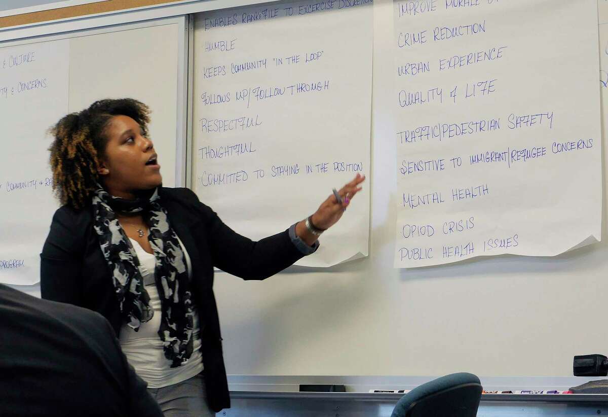 Jellisa Joseph, the chief diversity officer for the City of Albany, goes over the ideas that people say they would like to see in a police chief during a community forum held by the City of Albany to get input from the community on what they would like to see in a new police chief, on Sunday, April 15, 2018, at the Capital South Campus Center in Albany, N.Y. (Paul Buckowski/Times Union)