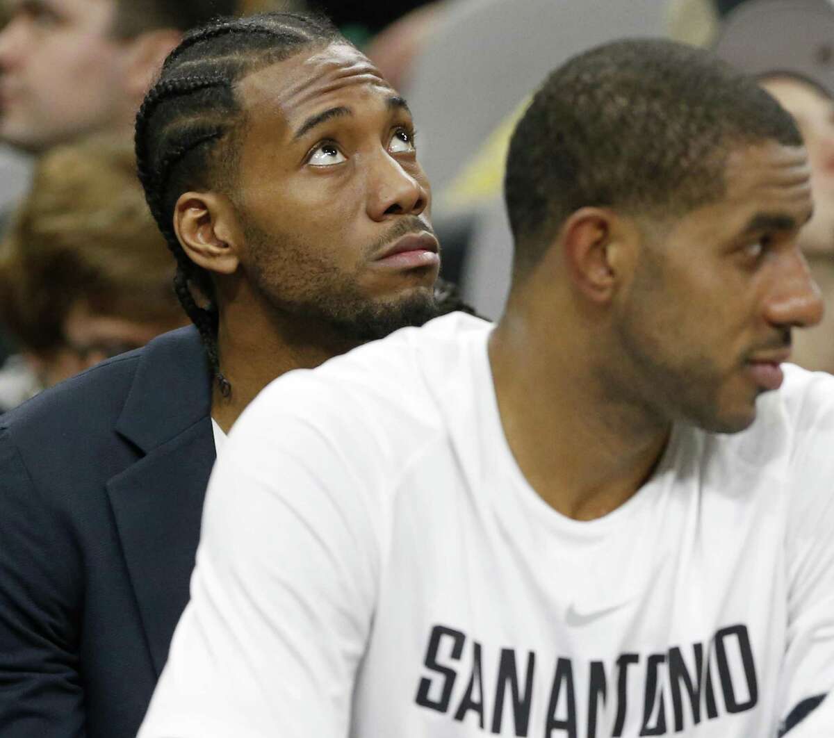 San Antonio Spurs' Kawhi Leonard sits behind LaMarcus Aldridge on the bench during first half action against the Indiana Pacers Sunday Jan. 21, 2018 at the AT&T Center.