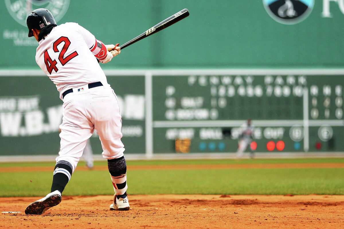 BOSTON, MA - APRIL 15: Brock Holt #12 of the Boston Red Sox bats in the second inning during a game against the Baltimore Orioles at Fenway Park on April 15, 2018 in Boston, Massachusetts. All players are wearing #42 in honor of Jackie Robinson Day. (Photo by Adam Glanzman/Getty Images)