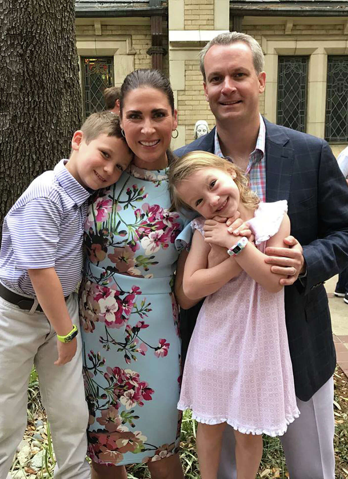 McCOY FAMILY: Fox Southwest Sportscaster and children’s book author Emily Jones McCoy is shown with her family: husband Mike McCoy and their children Henry and Hattie