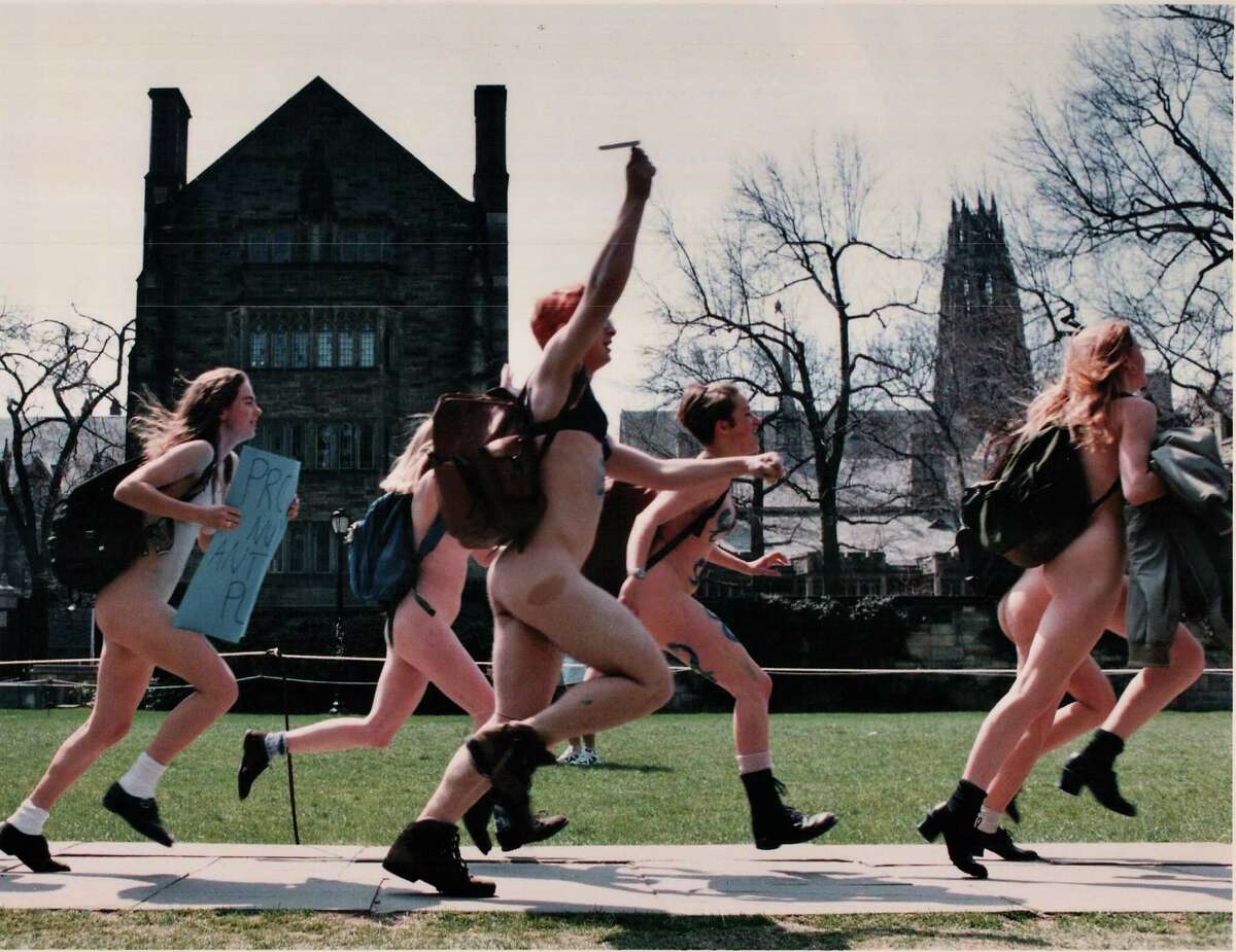 Yale students streaked across campus in 1995 in protest against the way Playboy portrays women. t reportedly was not the first time there was streaking on the Yale campus but a Register photographer caught this shot.