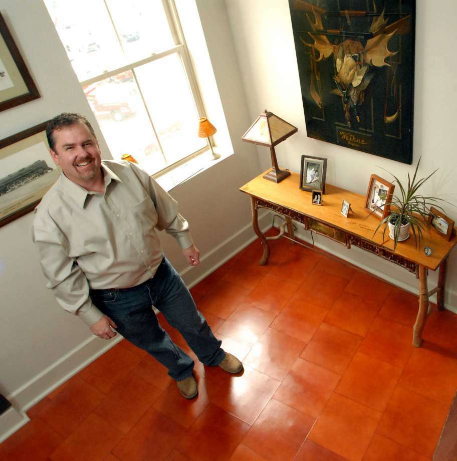 FILE — Robert Carville at a client's home in 2006 in Johnstown.
