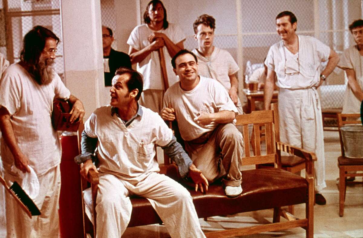 1975: American actor Jack Nicholson and others share a laugh in a still from the film, 'One Flew Over the Cuckoo's Nest,' directed by Milos Forman. (Photo by Republic Pictures/Republic Pictures/Getty Images)