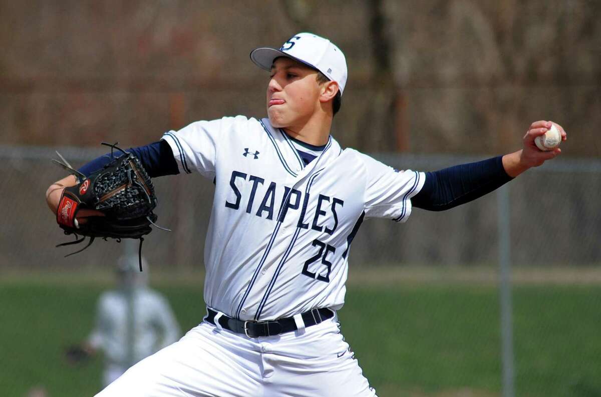 Jack Portman pitches for Staples against Xavier on April 7. Staples is one of four remaining unbeaten teams in Class LL.