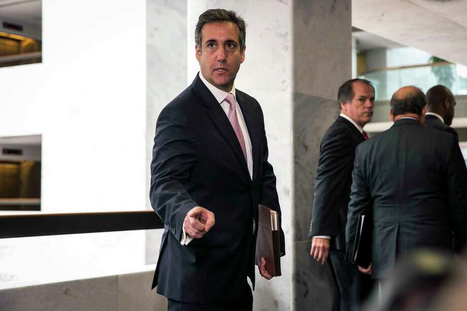 FILE -- Michael Cohen, President Donald Trumps longtime personal lawyer, speaks to reporters after a closed-door meeting with the Senate Intelligence Committee in Washington on Sept. 19, 2017. The FBI raided Cohen's office on Monday, April 9, 2018, seizing records related to several topics including payments to a pornographic-film actress. (Al Drago/The New York Times) Photo: AL DRAGO / NYTNS