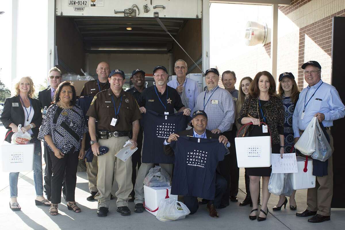 Elected officials and other volunteers for the Fort Bend Seniors Meals on Wheels delivered meals to home-bound seniors as part of the 16th Annual March for Meals event in Rosenberg on March 21.