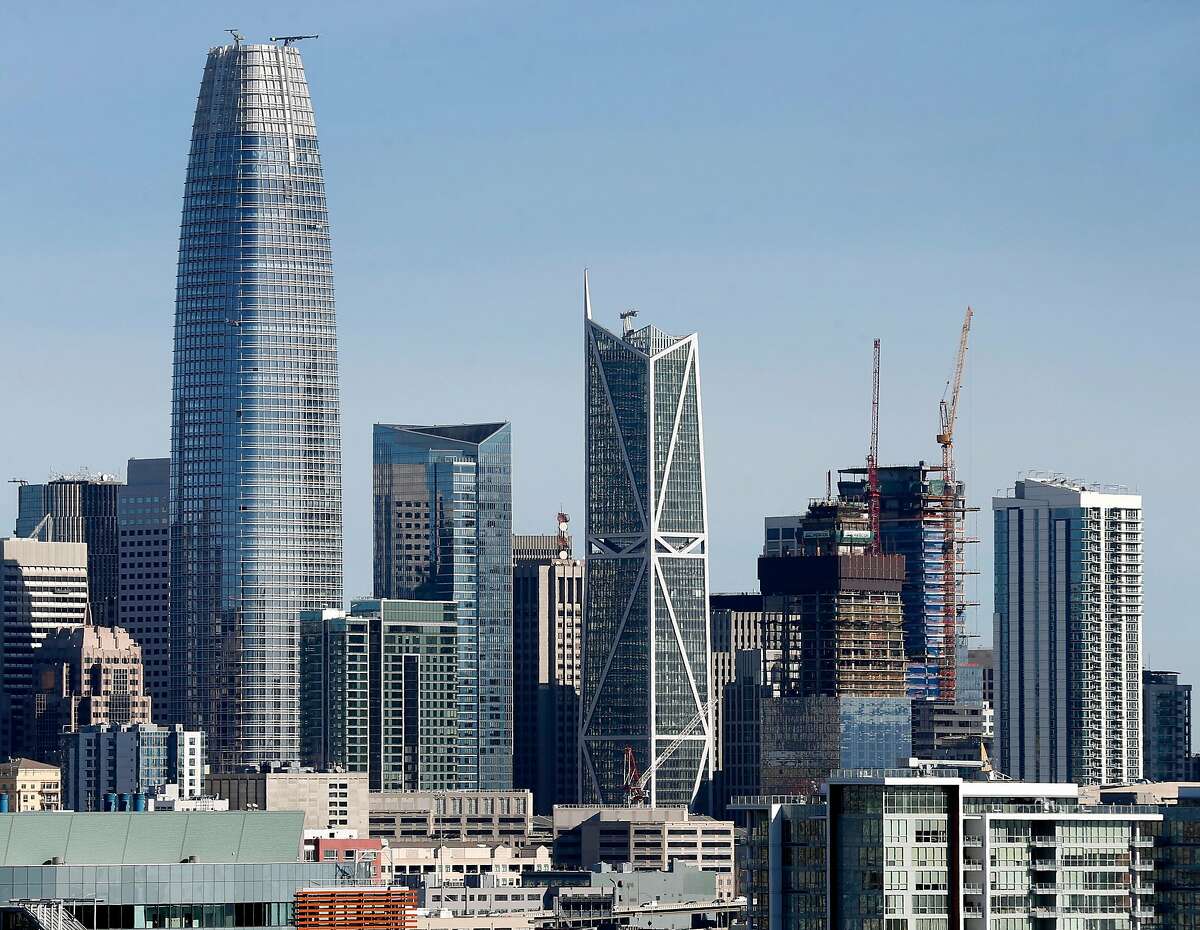 The Millennium Tower building rises between Salesforce Tower and 181 Fremont in San Francisco, Calif. on Tuesday, March 27, 2018. Engineers may begin preliminary work soon to stabilize the sinking and leaning Millennium Tower.