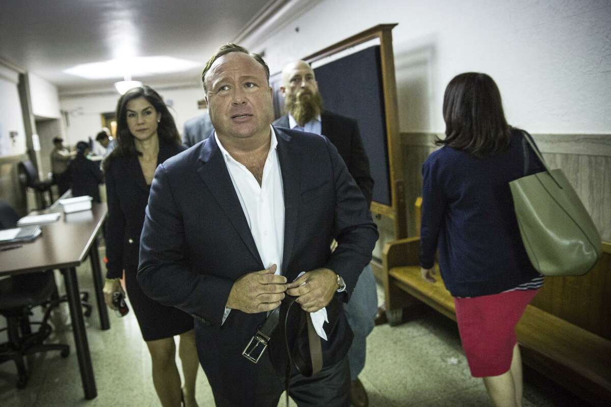 “Infowars” host Alex Jones arrives at the Travis County Courthouse in Austin in 2018.