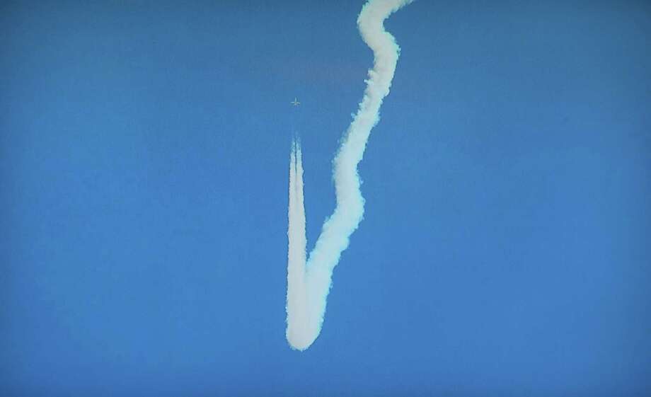 PHOTOS: Blast from the past NASA held a news conference to unveil plans to conduct a series of supersonic technology research flights over the Galveston, Texas, area, in support of the agency's Commercial Supersonic Technology Project. The flights, which will take off from nearby Ellington Airport, will take place in November 2018, and feature a NASA F/A-18 aircraft performing a series of supersonic dive maneuvers off the coast.( NASA PHOTO )>>See more for the of NASA's Space Shuttle Columbia... Photo: Steve Gonzales, Houston Chronicle / Houston Chronicle / © 2018 Houston Chronicle