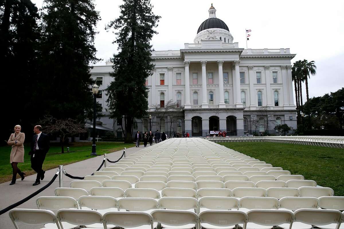 A sea of empty chairs are displayed on the north lawn of the State Capitol where Gov. Jerry Brown presented highlights of his proposed $131.7 billion budget for 2018-19 in Sacramento, Calif. on Wednesday, Jan. 10, 2018. The 1,570 chairs, each representing 20 students who, according to the California Faculity Association and who arranged the installation, have been denied admission to the California State University system despite having the grades eligible for acceptance.