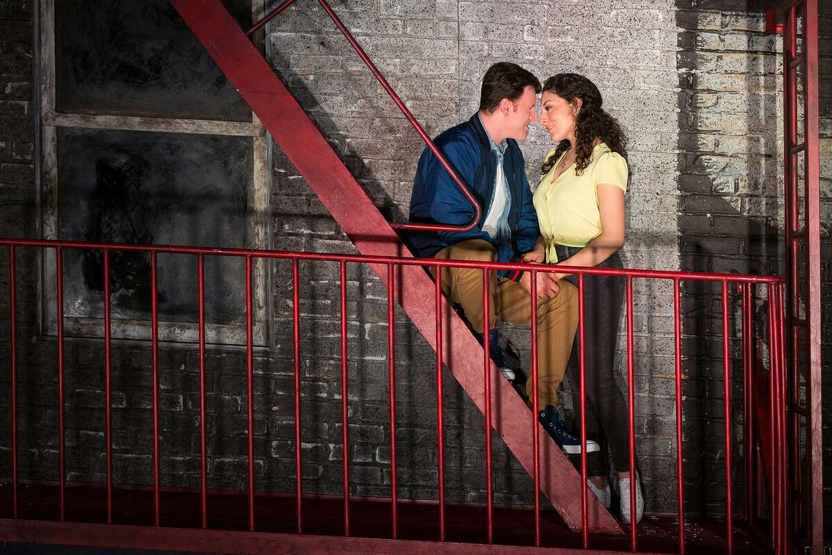 Andrea Carroll as Maria and Norman Reinhardt as Tony in the Houston Grand Opera’s production of “West Side Story.”