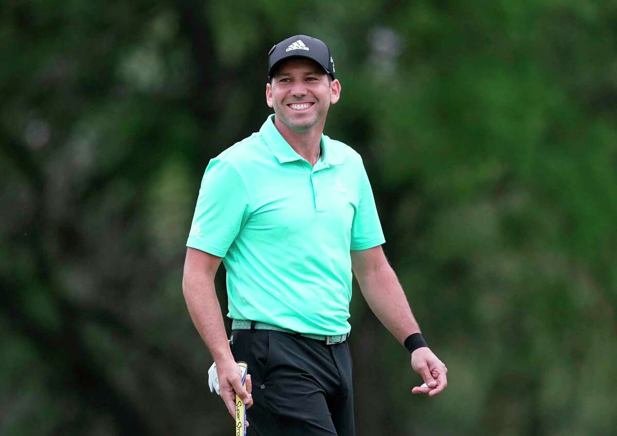 FILE - In this March 24, 2018, file photo, Sergio Garcia smiles as he prepares to putt on the first green during round four at the Dell Technologies Match Play golf tournament, in Austin, Texas. Sergio Garcia has a long history with Texas even before he became a part-time resident. Now, the connection extends to family. He married Angela Akins last summer, and he's based out of the Austin area when he's playing in America. Garcia also has a connection to the Valero Texas Open, where he is expected to play this week in San Antonio. (AP Photo/Eric Gay, File)