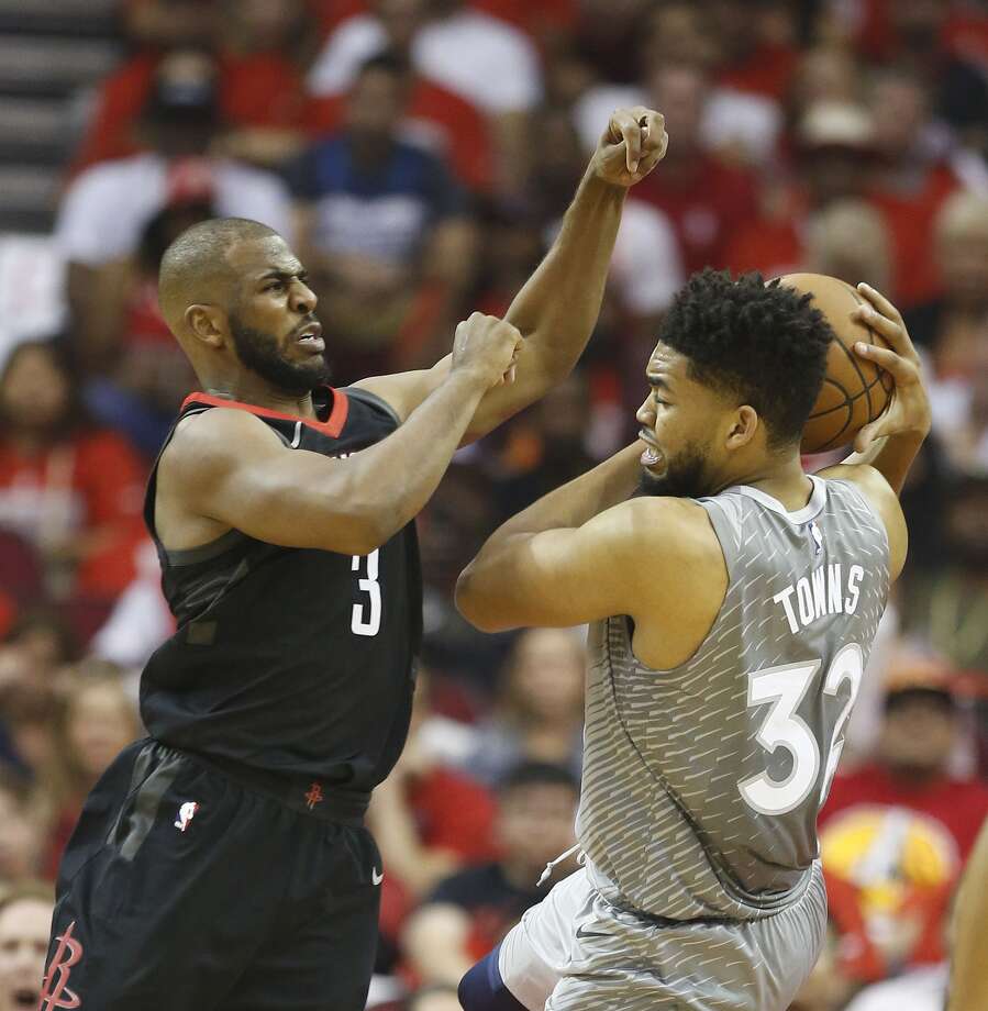 houston rockets guard chris paul (3) battles against minnesota