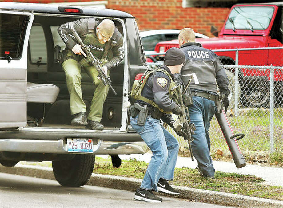 Two charged after Wood River police execute drugrelated raid Alton