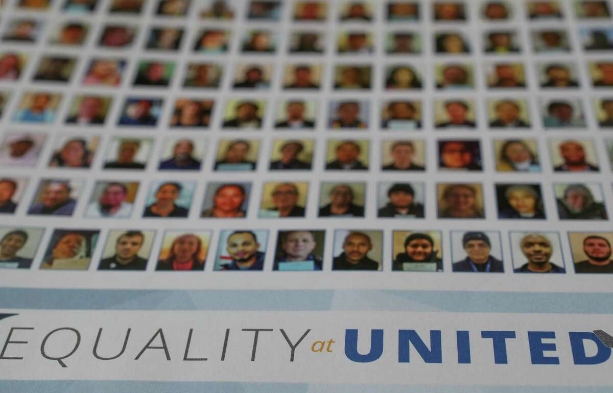 Unite Here has created a poster with United Airlines employees photos that have joined other workers to try to create a union Wednesday, April 18, 2018, in Houston. ( Steve Gonzales / Houston Chronicle )