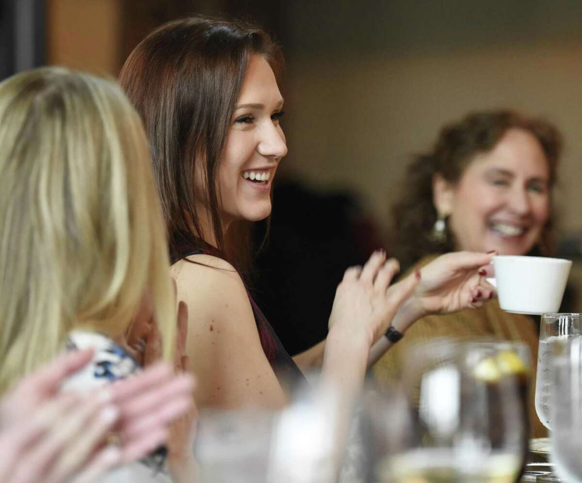 Miss Connecticut 2017 Olga Litvinenko is introduced at the Friends of Autistic People (FAP) luncheon fundraiser at The Spread in Greenwich, Conn. Thursday, April 19, 2018. Litvinenko spoke about her inspiring journey to become Miss Connecticut. The luncheon celebrated FAP's 20-year commitment to advocacy, education, and serving kids and adults with autism. There was also a live auction for jewelry, accessories, and a gift certificate for a one-on-one dinner with Miss Connecticut.