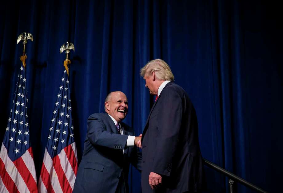 FILE -- Rudy Giuliani, left, campaigns with Donald Trump, then the Republican nominee for president,  in Greenville, N.C., Sept. 6, 2016.  Giuliani, the former New York City mayor and longtime friend of Trump, will join the presidents legal team in an effort to quickly resolve the special counsel investigation into Russian election interference and possible ties to Trump associates.  (Eric Thayer/The New York Times) Photo: ERIC THAYER / NYTNS