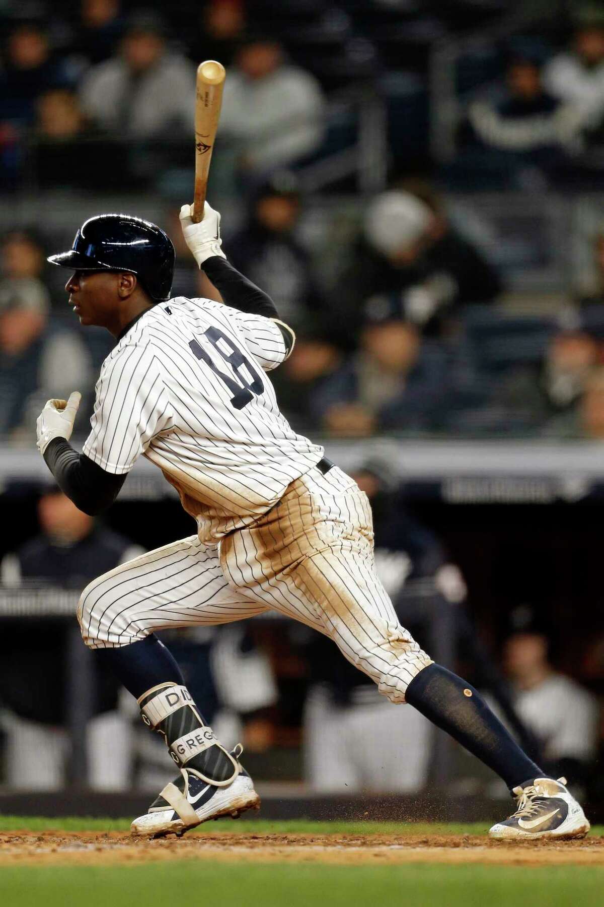 NEW YORK, NY - APRIL 19: Didi Gregorius #18 of the New York Yankees hits an RBI single against the Toronto Blue Jays during the fifth inning at Yankee Stadium on April 19, 2018 in the Bronx borough of New York City. (Photo by Adam Hunger/Getty Images)
