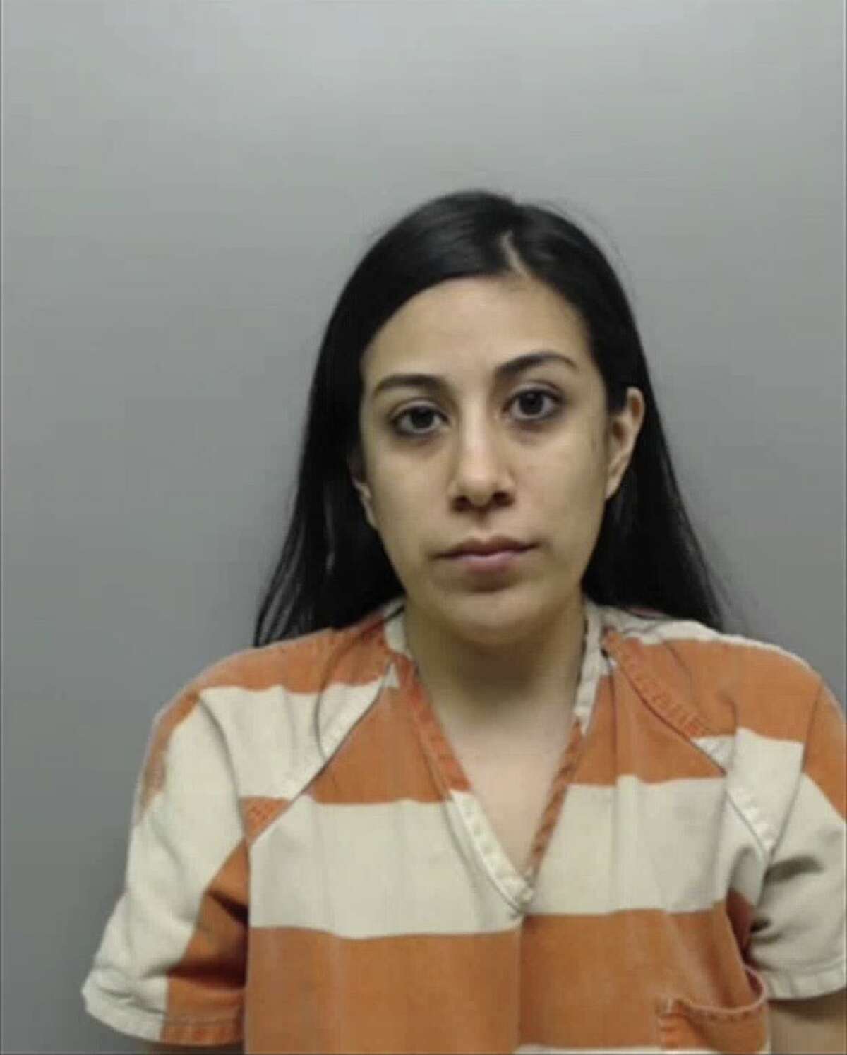Priscilla Marisol Flores, 34, was charged with two counts of child abandonment with intent to return.