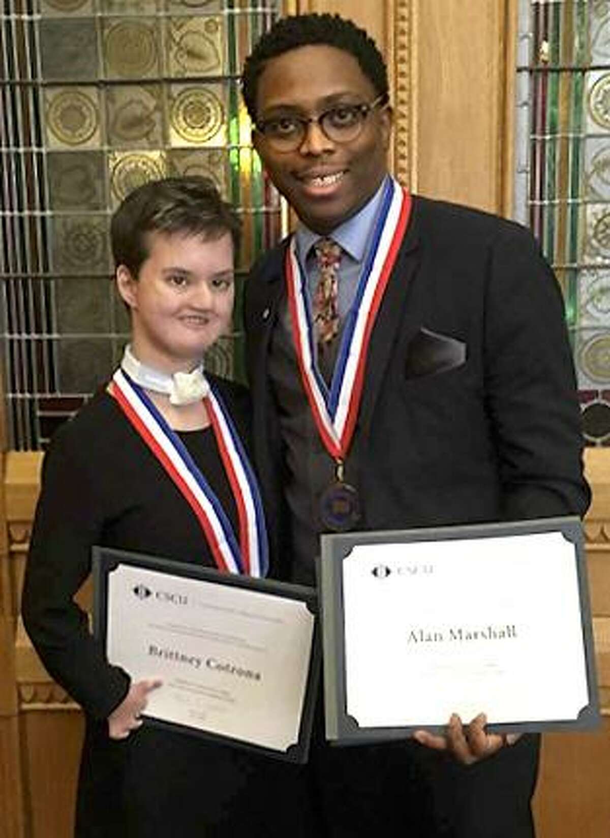 Middlesex Community College students Brittney Cotrona of Meriden, left, and Alan Marshall of Middletown were presented All-Connecticut Academic Team awards earlier this month at the state Capitol.