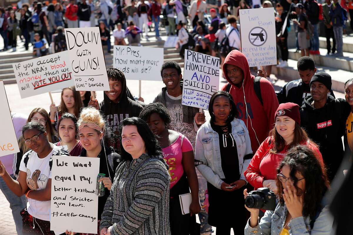 Students gather for the event to listen to speeches at Pittsburg High School during a day of action against gun violence on campus in Pittsburg, Calif., on Fri. April 20, 2018.