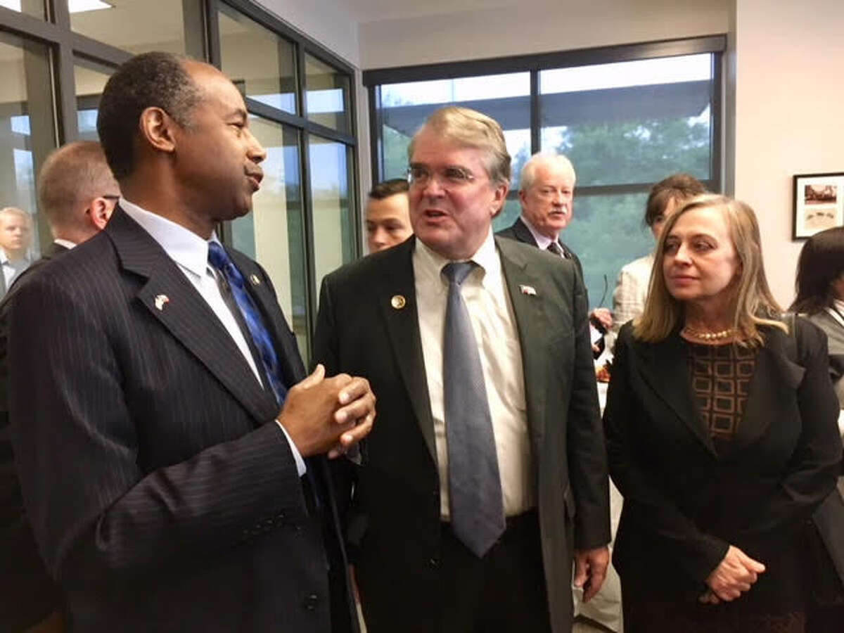 HUD Secretary Ben Carson, left, has called a fair housing rule "social engineering. " Carson appeared in April with U.S. Rep. John Culberson, R-Houston, and West University Place Mayor Susan Samples at Southside Place Police & Fire Department.