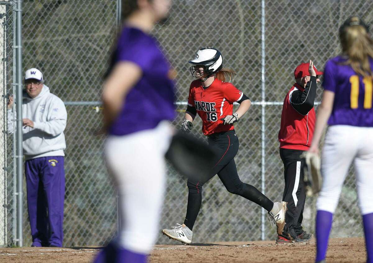 Fairfield Warde Olivia Vadas (16) heads to homeplate following a sixth inning homerun against Westhill in a FCIAC girls softball game at Westhill High School in Stamford, Conn. on April 20, 2018. Fairfield Warde defeated Westhill 9-4.