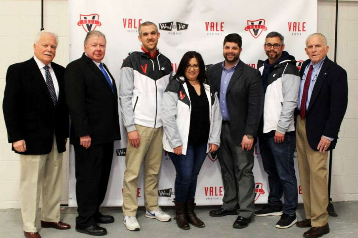 Vale Fields + Courts held a grand opening April 9 at 1280 Newfield St., Middletown. From left are Middletown Small Business Development Counselor Paul Dodge, Middlesex Chamber Vice Chairman Jay Polke, Zach Eddinger, Rosa Graca, Mayor Dan Drew, Jeremy Hamel and Chamber President Larry McHugh.
