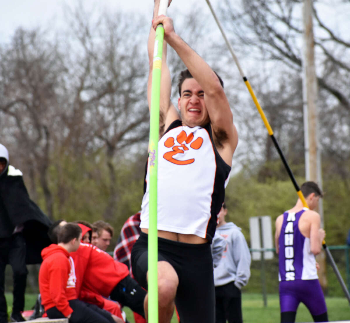 Edwardsville senior Blake Neville competes in the pole vault during the Winston Brown Track and Field Invitational on Saturday at EHS. Neville took second.