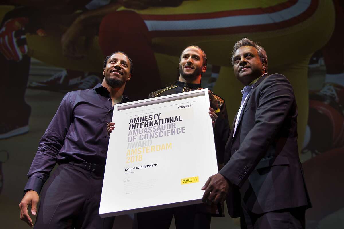 April 21 2018 - Kaepernick is awarded Ambassador of Conscience Award in Amsterdam by Amnesty International. The award is "dedicated to fighting injustice and using their talents to inspire others," and presented to Kaepernick by former teammate Eric Reid. In his speech Kaepernick decries police killings as